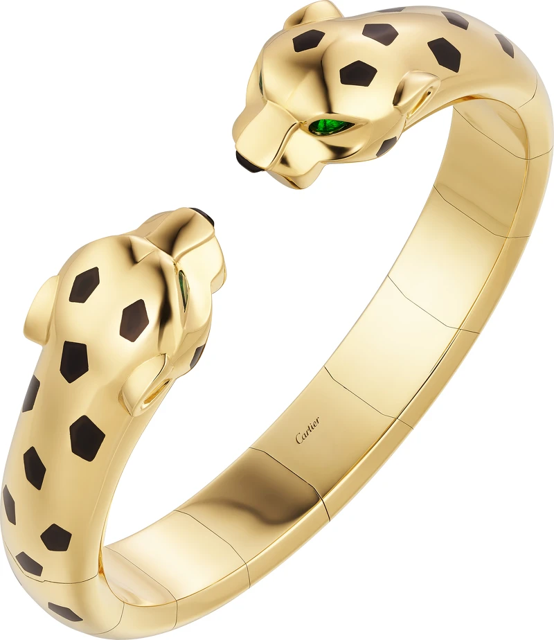 Panthère de Cartier美洲豹手環 鉸鍊式，黃K金，縞瑪瑙，黑色真漆，鑲嵌4顆沙弗萊石。 參考價格約NT$ 1,610,000