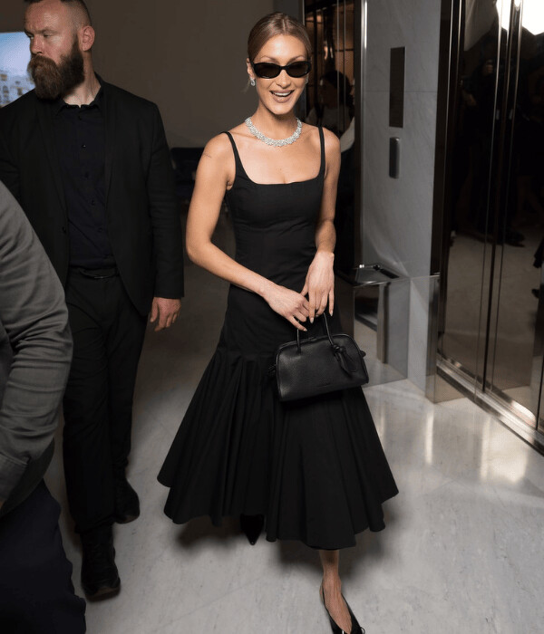Bella Hadid with Jacquemus Le Turismo shoulder bag. Bella Hadid with Jacquemus Le Turismo shoulder bag.