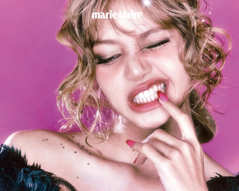 外套為 Louis Vuitton。 外套為 Louis Vuitton。