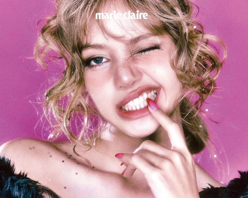 外套為 Louis Vuitton。 外套為 Louis Vuitton。