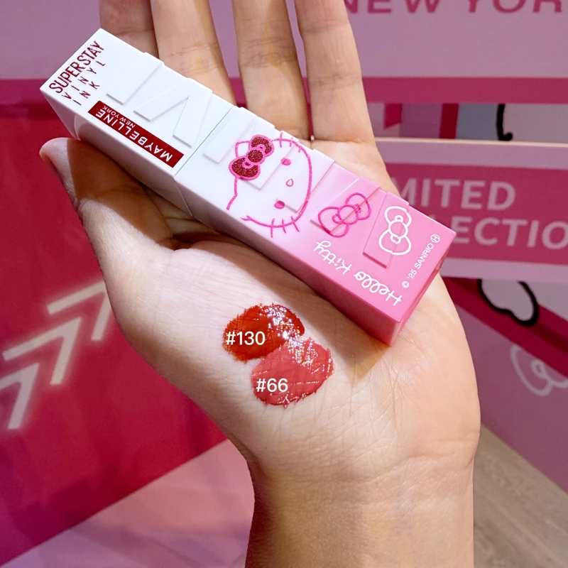 媚比琳x Hello Kitty超持久水光鎖吻唇釉(#66甜粉澎澎裙、#130重焙赤茶)，NT499