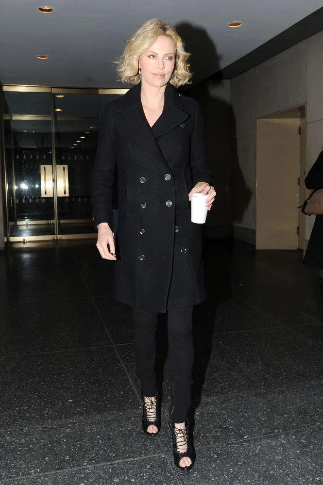 Charlize Theron wearing Burberry in New York